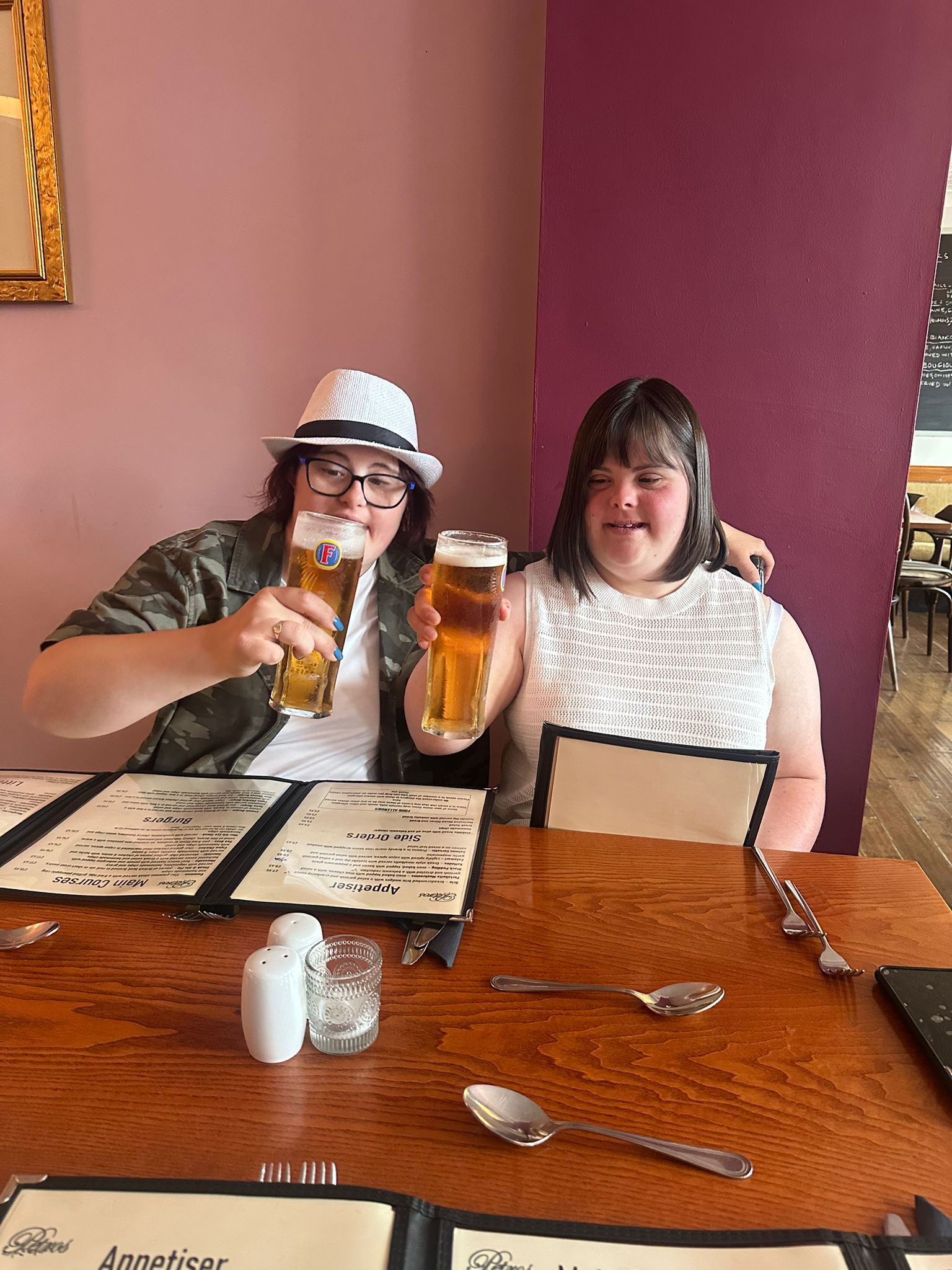 Two people enjoying a drink